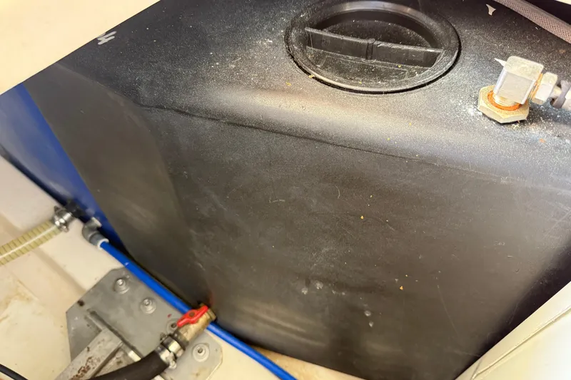 Slide: The Image of Fuel tank of a 2013 Greenline 33 boat, showing connections and fittings. - 93