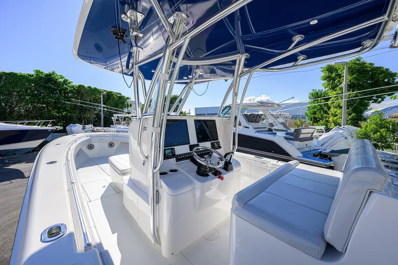 Slide: The Image of 2021 Contender 35 ST boat interior with modern helm and seating. - 19