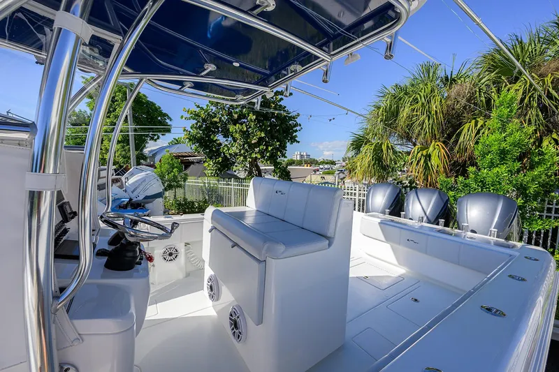 Slide: The Image of 2021 Contender 35 ST boat interior with seating and multiple outboard engines. - 24
