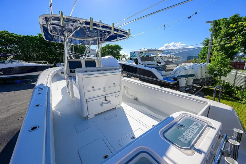 Slide: The Image of 2021 Contender 35 ST boat with sleek design, spacious deck, and modern console. - 30