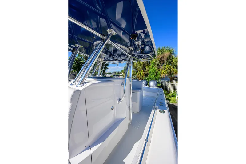 Slide: The Image of 2021 Contender 35 ST boat with sleek design and polished metal accents. - 42