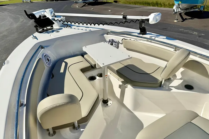 Slide: The Image of 2025 Key West 203 FS boat interior with seating and table, showcasing modern design. - 12