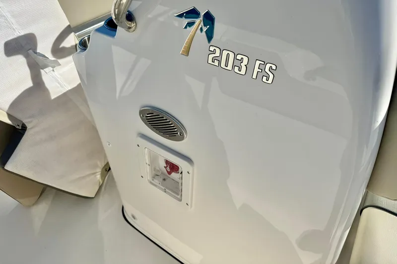 Slide: The Image of 2025 Key West 203 FS boat console with logo and speaker detail. - 22