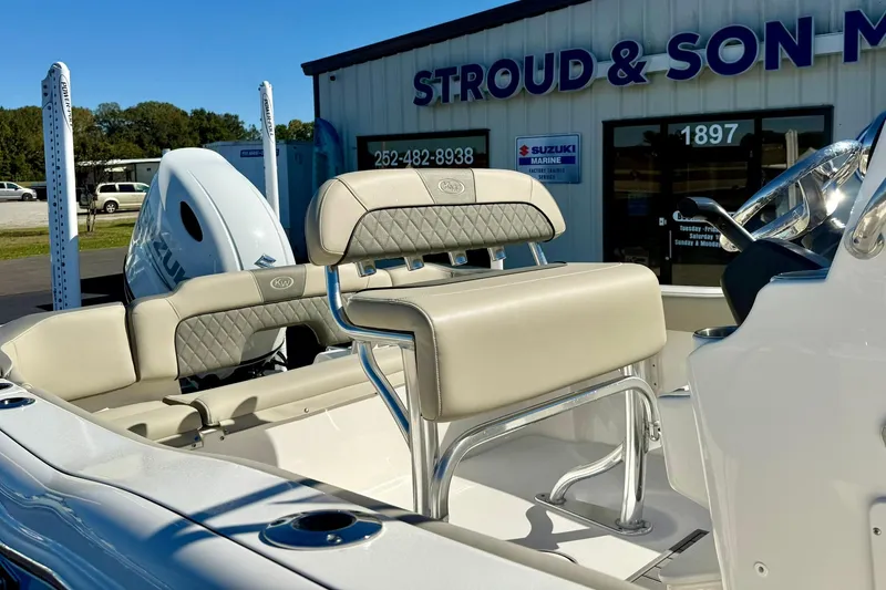 Slide: The Image of 2025 Key West 203 FS boat interior with seating, displayed at dealership. - 23