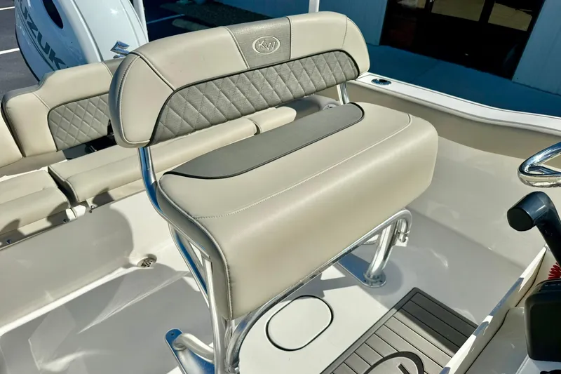 Slide: The Image of 2025 Key West 203 FS boat seat with cushioned backrest and sleek design. - 24