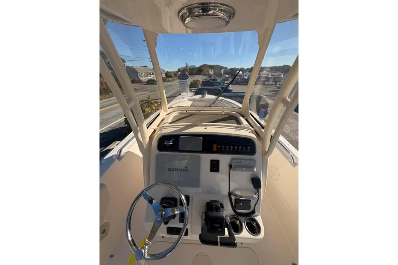Slide: The Image of 2017 Grady-White Fisherman 257 boat dashboard with Garmin navigation system. - 12