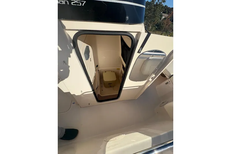 Slide: The Image of 2017 Grady-White Fisherman 257 boat interior with open hatch and storage area. - 14