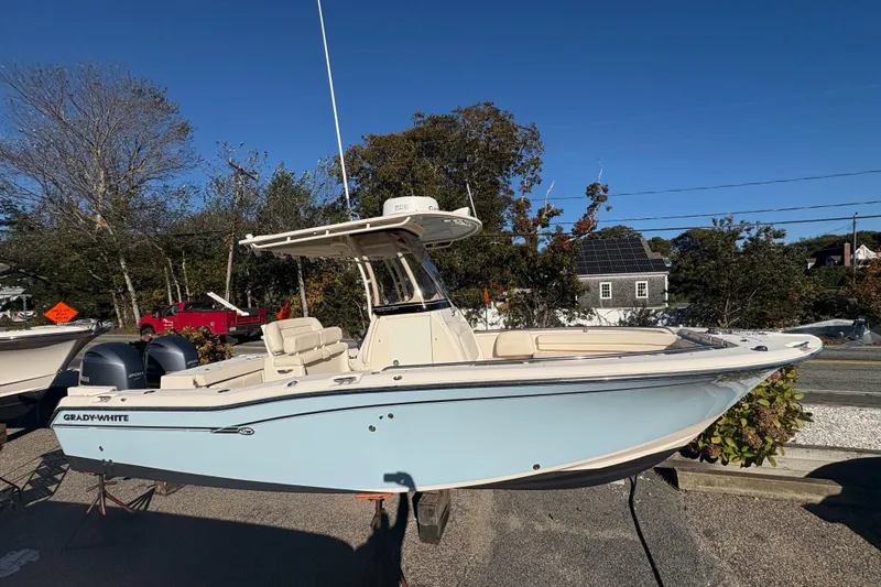 Slide: The Image of 2017 Grady-White Fisherman 257 boat on display, featuring dual engines and sleek design. - 4