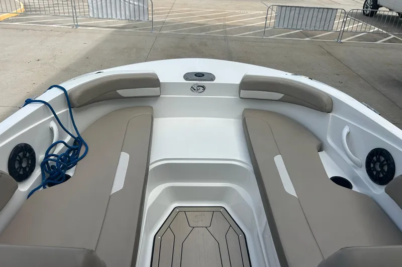 Slide: The Image of 2022 Hurricane SunDeck Sport 185 OB boat interior with beige seating and blue rope. - 19