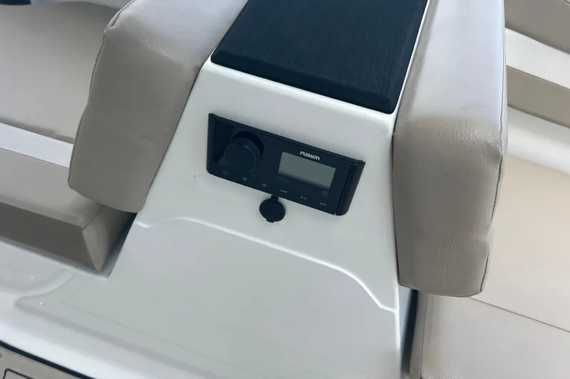Slide: The Image of 2022 Hurricane SunDeck Sport 185 OB boat console with Fusion audio system. - 22