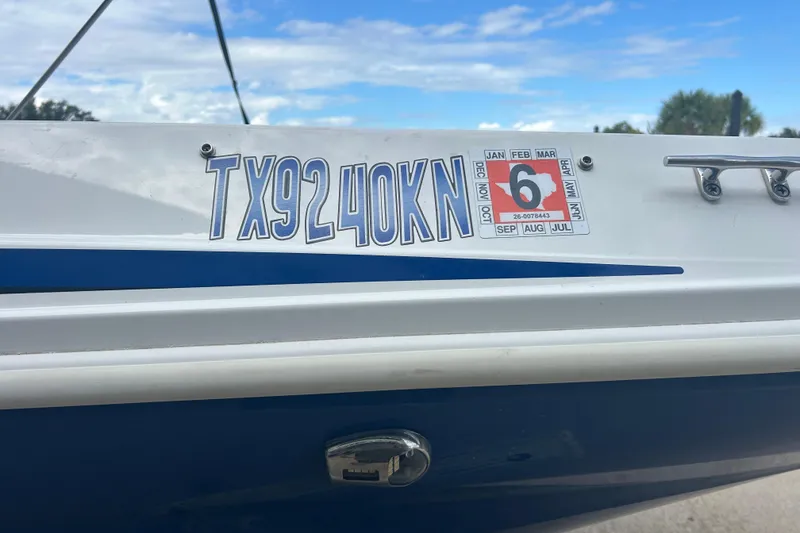 Slide: The Image of 2022 Hurricane SunDeck Sport 185 OB boat with registration TX9240KN and inspection sticker. - 27