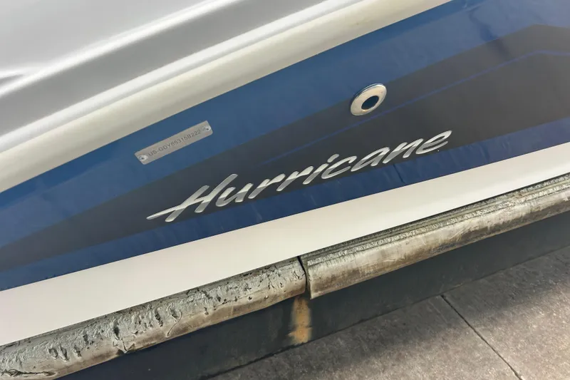 Slide: The Image of 2022 Hurricane SunDeck Sport 185 OB boat with blue and white hull. - 6