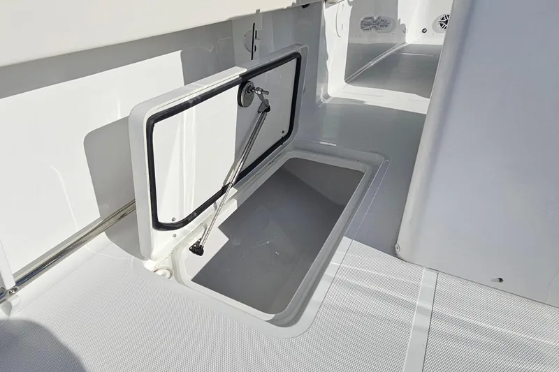 Slide: The Image of 2026 Sea Hunt Gamefish 30 Forward Seating storage compartment, open and spacious design. - 19
