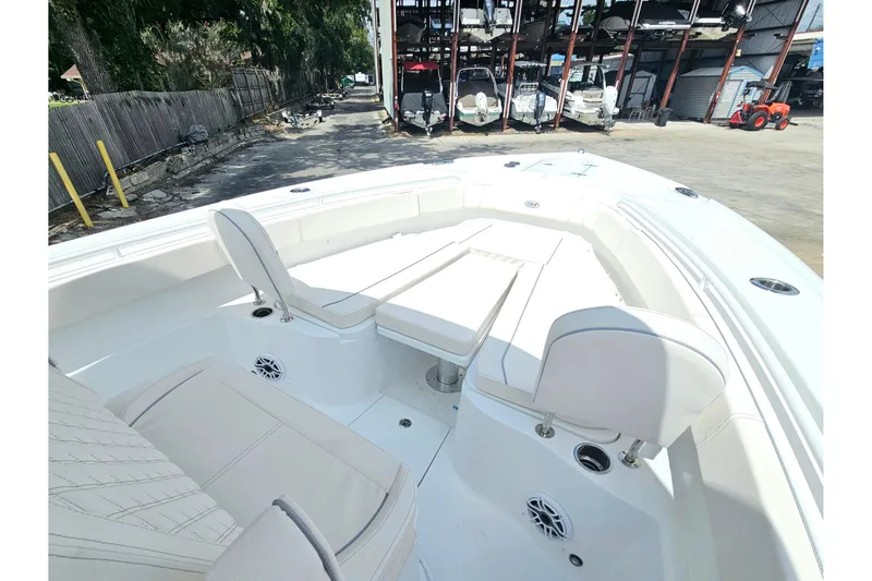 Slide: The Image of 2026 Sea Hunt Gamefish 30 Forward Seating boat with spacious white interior and seating. - 33
