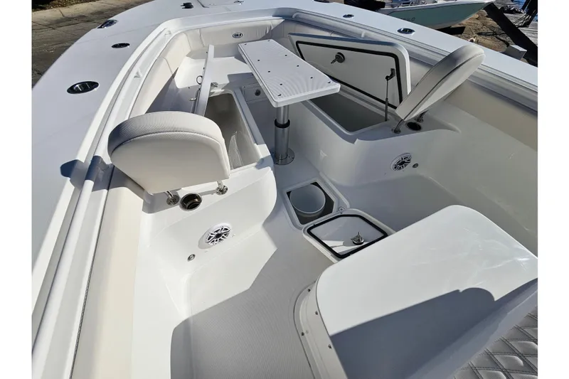 Slide: The Image of 2026 Sea Hunt Gamefish 30 Forward Seating with open storage and seating area. - 35