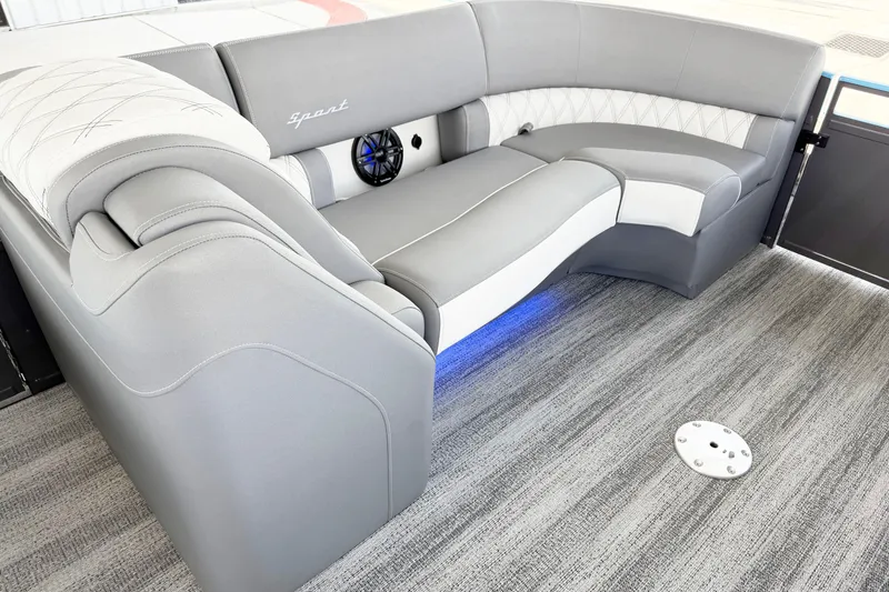 Slide: The Image of Luxurious seating in 2025 Bennington 23RX boat with elegant gray upholstery and ambient lighting. - 8