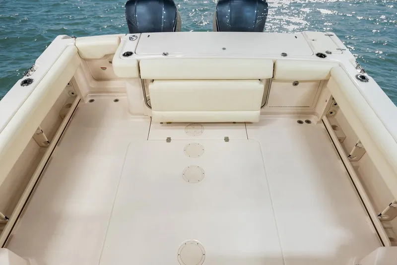Slide: The Image of Control panel of 2019 Grady-White Express 330 boat with Yamaha throttle and joystick. - 12