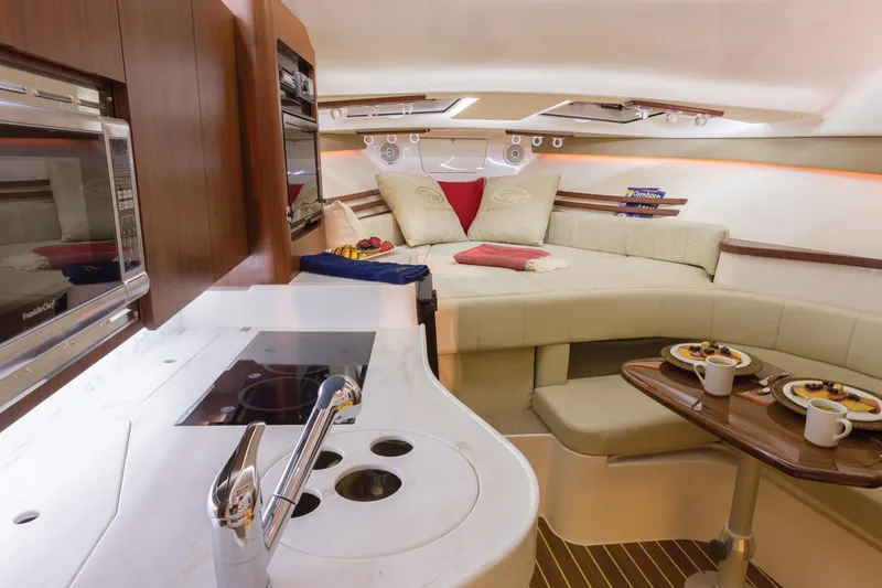 Slide: The Image of 2019 Grady-White Express 330 boat interior with cushioned seating and spacious deck. - 17