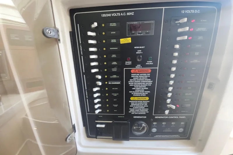 Slide: The Image of Electrical control panel on a 2019 Grady-White Express 330 boat. - 29