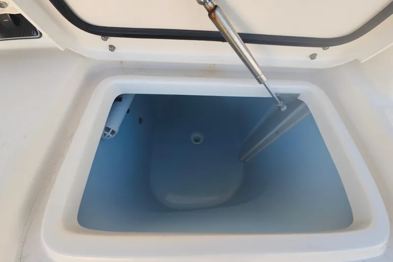 Slide: The Image of Open storage compartment on 2019 Grady-White Express 330 boat. - 31