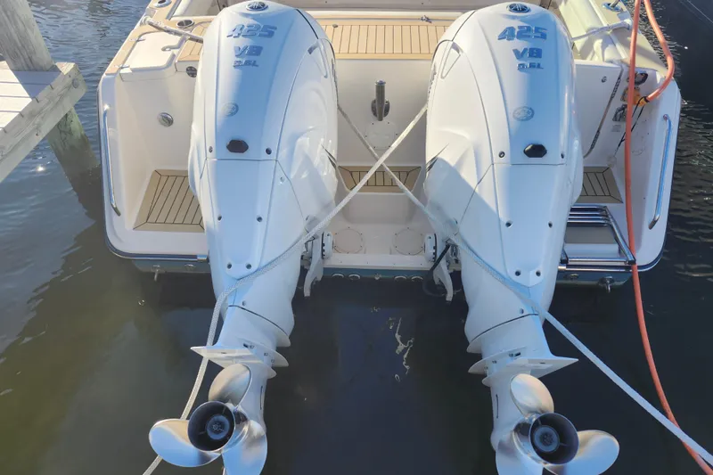 Slide: The Image of 2019 Grady-White Express 330 with twin 425 V8 outboard engines at dock. - 34
