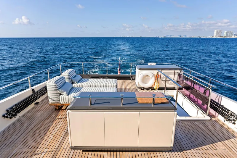 Slide: The Image of Luxurious 2020 Ferretti Yachts 920 deck with ocean view and elegant seating. - 16