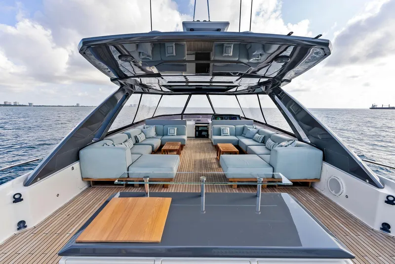 Slide: The Image of Luxurious 2020 Ferretti Yachts 920 with spacious deck and elegant seating on open water. - 18