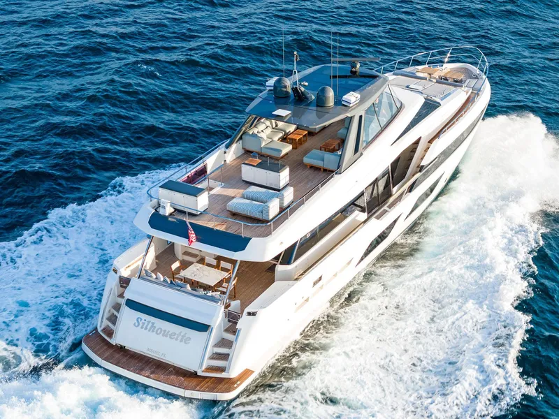 Slide: The Image of Luxurious 2020 Ferretti Yachts 920 cruising on open sea, showcasing elegant design and spacious deck. - 2