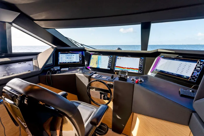 Slide: The Image of Cockpit of 2020 Ferretti Yachts 920 with advanced navigation systems and ocean view. - 33