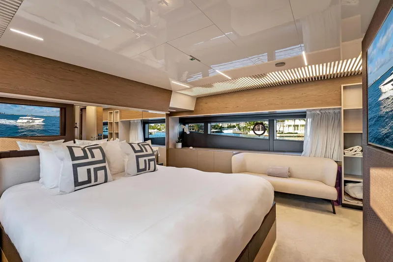 Slide: The Image of Luxurious bedroom interior of 2020 Ferretti Yachts 920, featuring elegant design and large windows. - 40