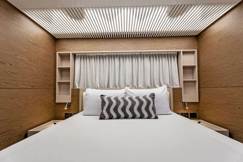 Slide: The Image of Luxurious bedroom interior of 2020 Ferretti Yachts 920 with modern design and elegant bedding. - 45
