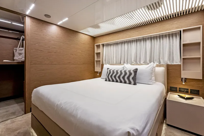 Slide: The Image of Luxurious bedroom interior of 2020 Ferretti Yachts 920, featuring modern design and cozy bedding. - 48