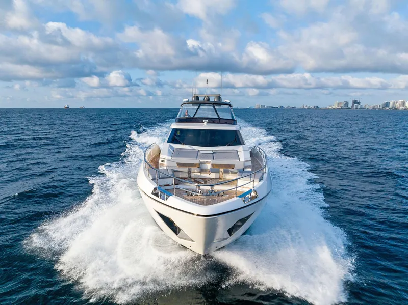 Slide: The Image of 2020 Ferretti Yachts 920 cruising on open sea under blue sky. - 6