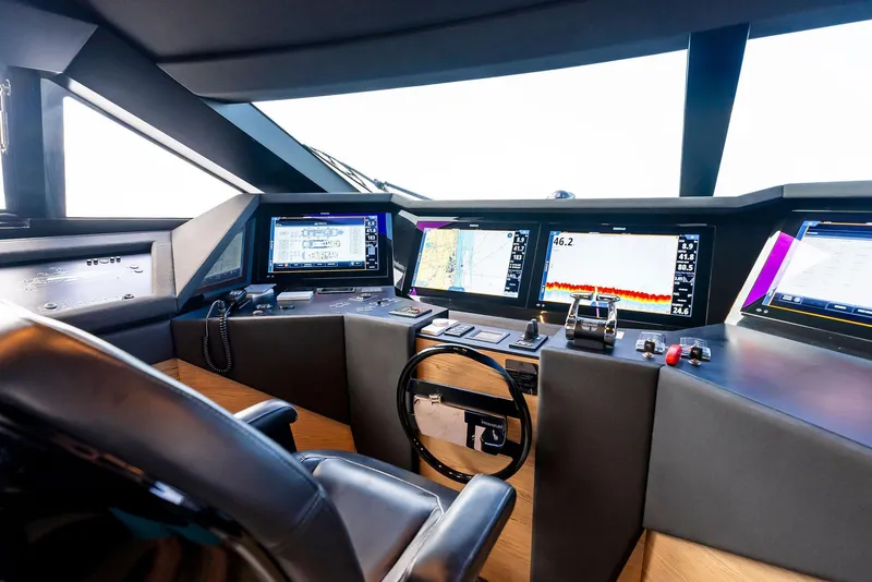 Slide: The Image of Cockpit of 2020 Ferretti Yachts 920, featuring advanced navigation systems and luxurious design. - 31