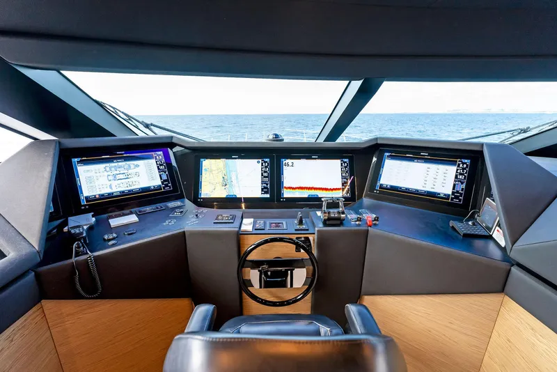 Slide: The Image of Helm of 2020 Ferretti Yachts 920, featuring advanced navigation systems and ocean view. - 32