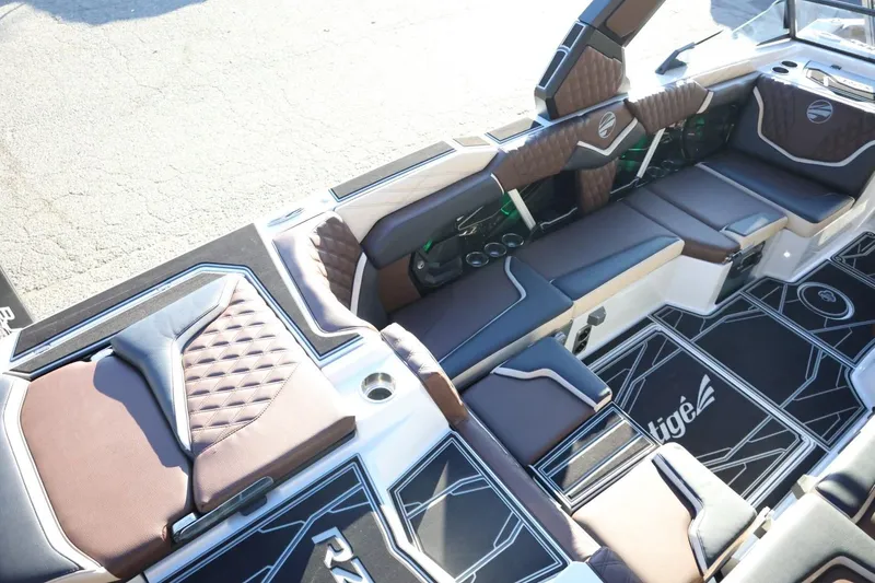 Slide: The Image of Luxurious interior of 2026 Tigé 24RZX boat with stylish seating and modern design. - 11