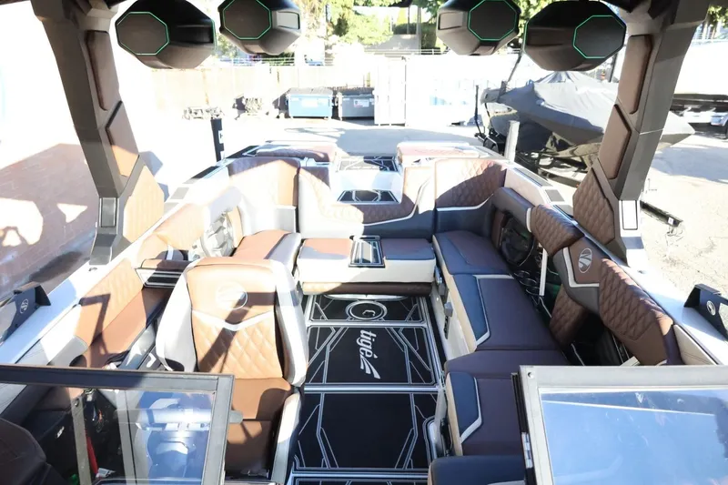 Slide: The Image of 2026 Tigé 24RZX boat interior with luxurious seating and modern design features. - 21