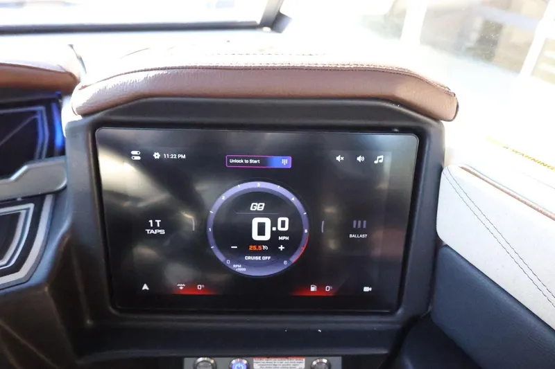 Slide: The Image of Touchscreen dashboard of 2026 Tigé 24RZX boat displaying speed and controls. - 25