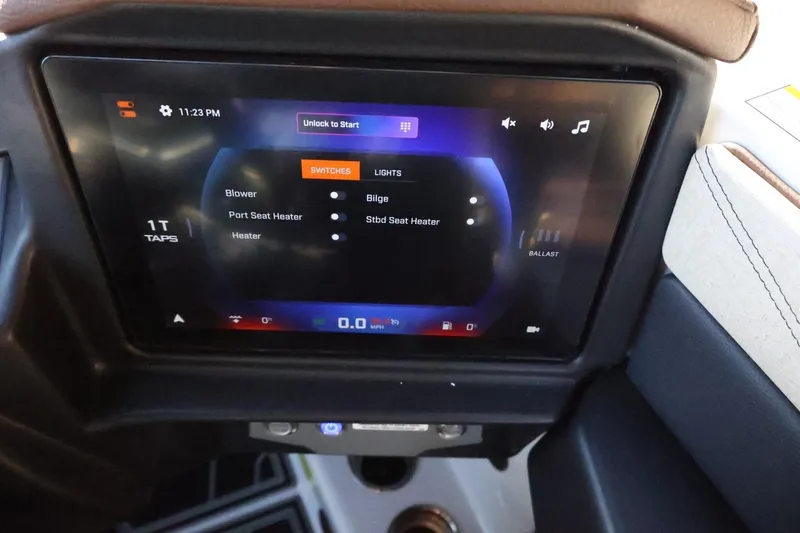 Slide: The Image of Touchscreen control panel in a 2026 Tigé 24RZX boat, displaying various system settings. - 30