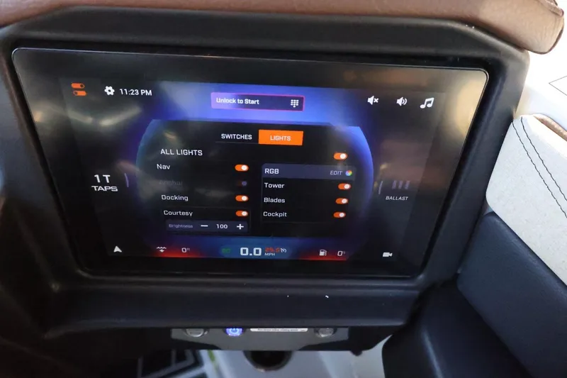 Slide: The Image of Touchscreen control panel in 2026 Tigé 24RZX boat, displaying lighting and navigation settings. - 31