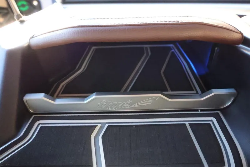 Slide: The Image of 2026 Tigé 24RZX interior detail with logo and sleek design elements. - 33
