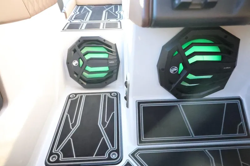 Slide: The Image of 2026 Tigé 24RZX boat interior with illuminated speakers and stylish flooring. - 35
