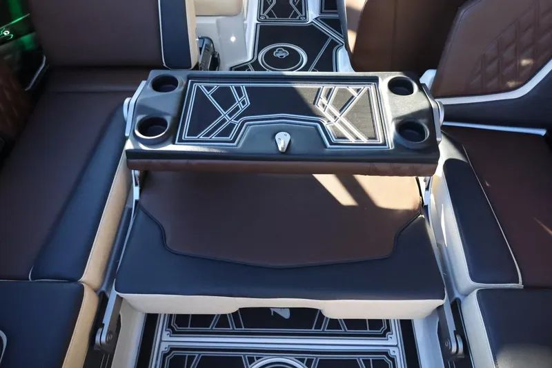 Slide: The Image of 2026 Tigé 24RZX boat interior with stylish seating and cup holders. - 50