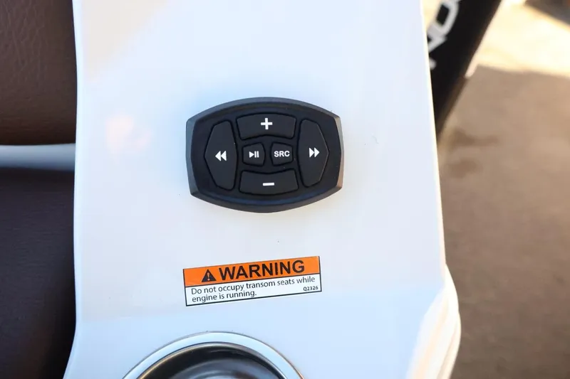 Slide: The Image of Control panel on 2026 Tigé 24RZX boat with warning label. - 56