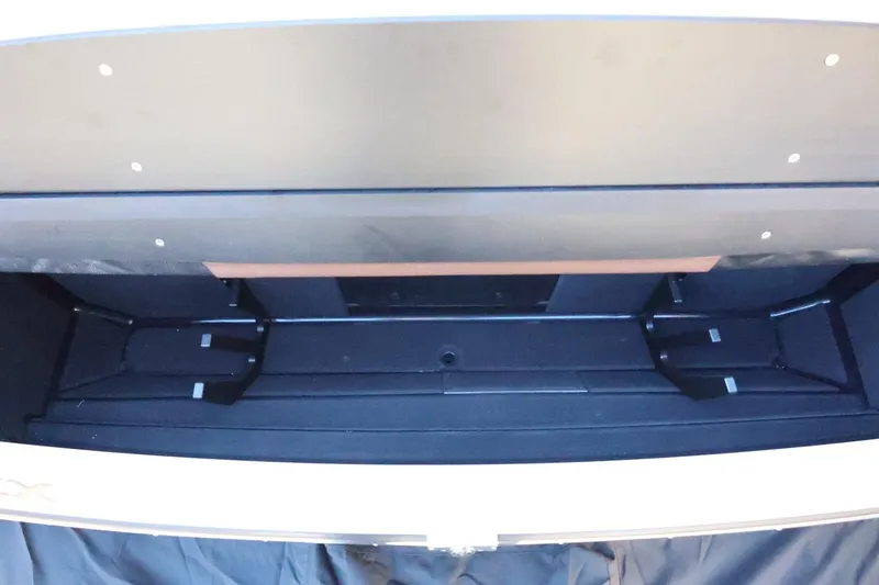 Slide: The Image of Storage compartment of 2026 Tigé 24RZX boat, showcasing spacious interior design. - 57