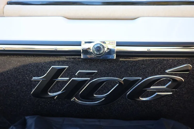 Slide: The Image of 2026 Tigé 24RZX boat logo with sleek black lettering and chrome accents. - 58
