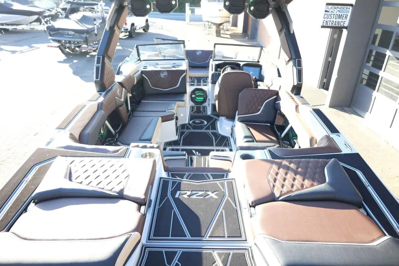 Slide: The Image of 2026 Tigé 24RZX boat interior with luxurious seating and modern design. - 9