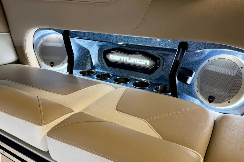 Slide: The Image of Interior of 2025 Centurion Ri245 boat with premium seating and integrated speakers. - 11