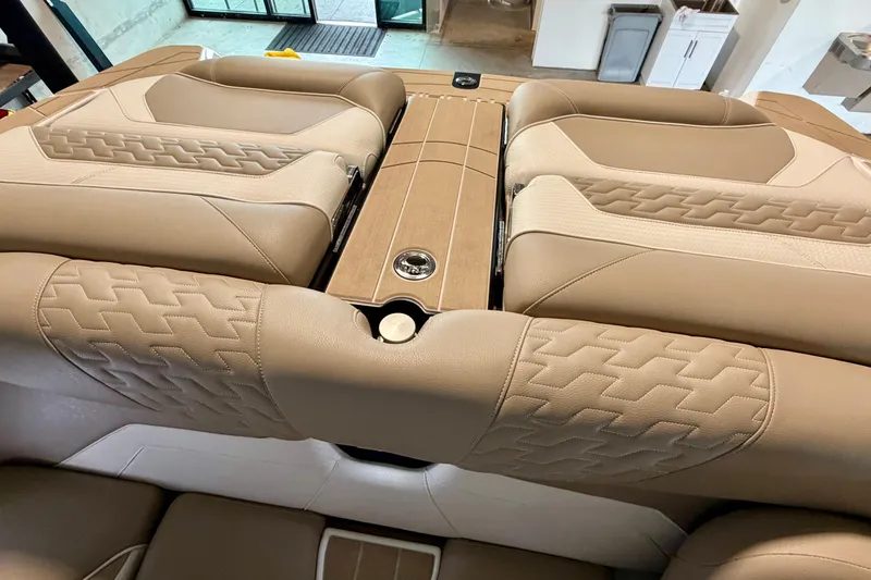 Slide: The Image of Luxurious interior of 2025 Centurion Ri245 boat with beige leather seating. - 13