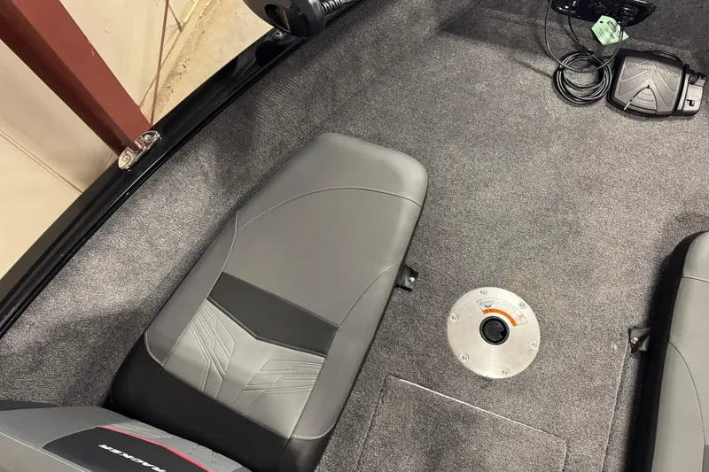 Slide: The Image of Interior of 2026 Tracker Pro Guide V-175 Combo boat with gray seating and carpeted floor. - 14